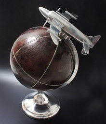 Large aviation theme leather globe and plane on stand