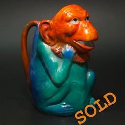 Amusing 1930's polychrome ceramic monkey jug