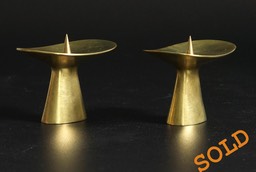 Pair of Carl Auböck, Vienna solid brass candlesticks